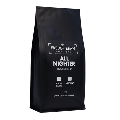 Black coffee bag labeled 'Freddy Bean Roasters All Nighter' on a gray background