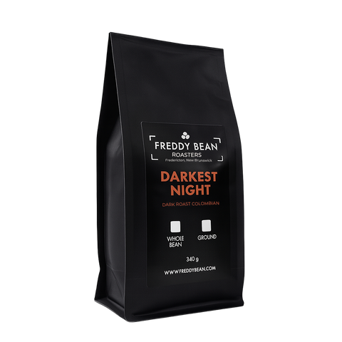 Black coffee bag from Freddy Bean Roasters with 'Darkest Night' label on a white background