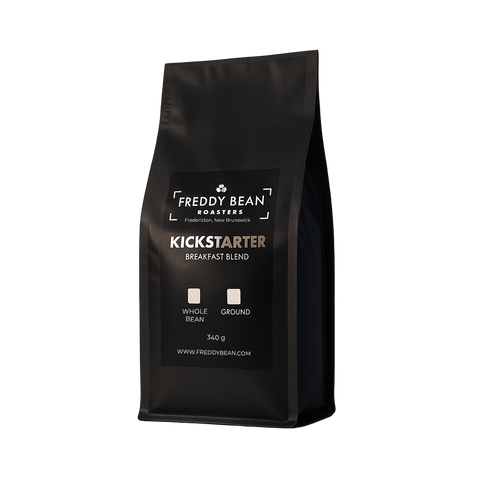 Black coffee bag with Freddy Bean Roasters branding on a light gray background