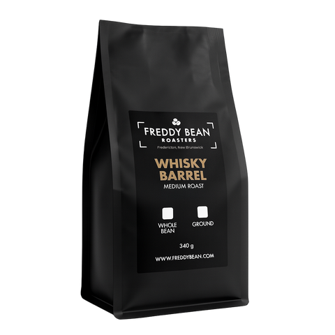 Black coffee bag labeled 'Whisky Barrel' by Freddy Bean on a white background
